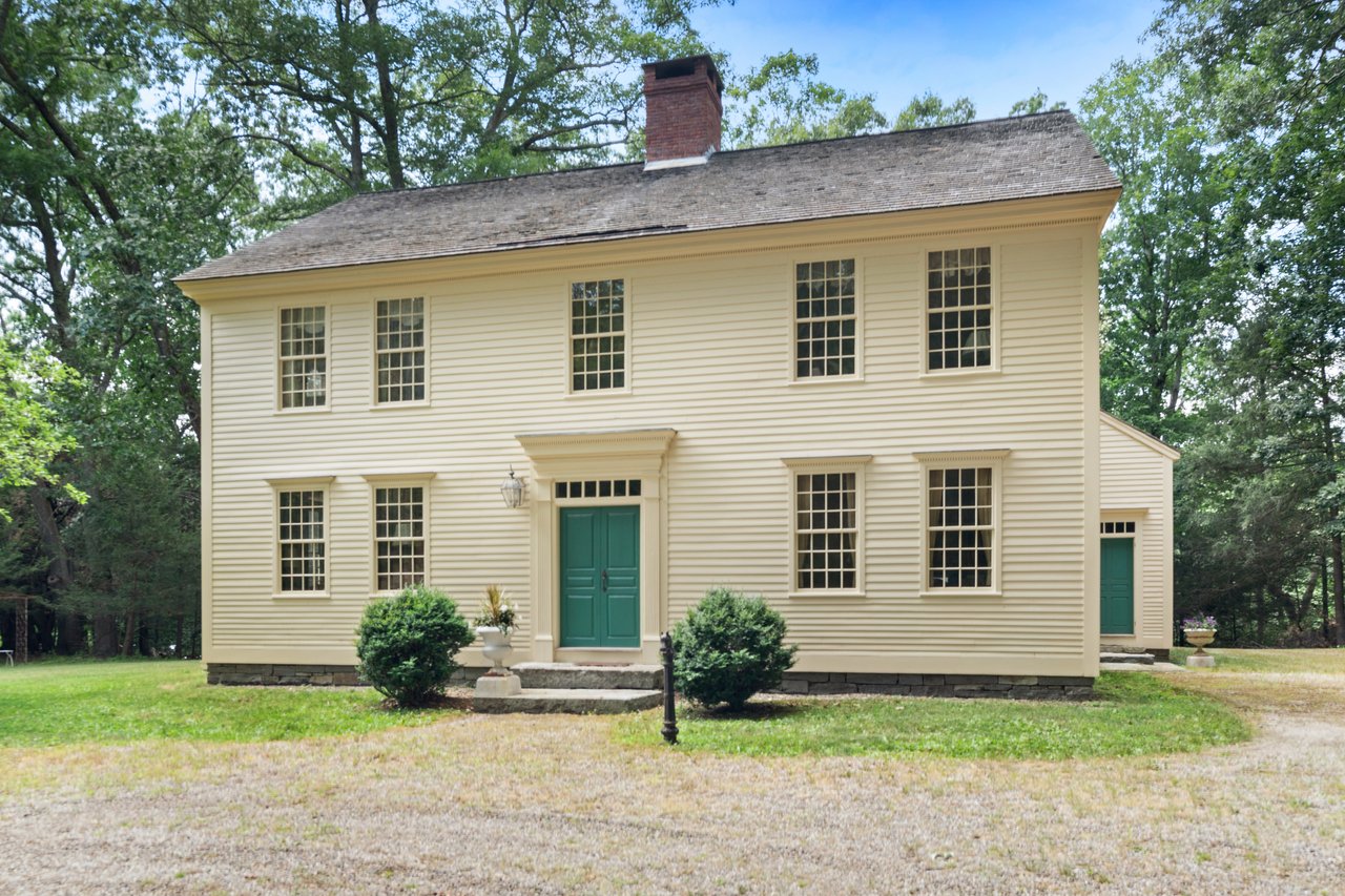 Among the notable exterior period details are custom built 12 over 12 windows with original glass panes showering sunlight into the residence to balance the double front door.