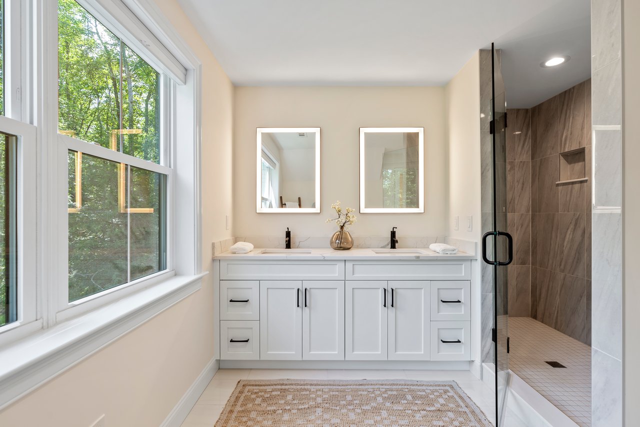 Double sinks and walk in tiled shower