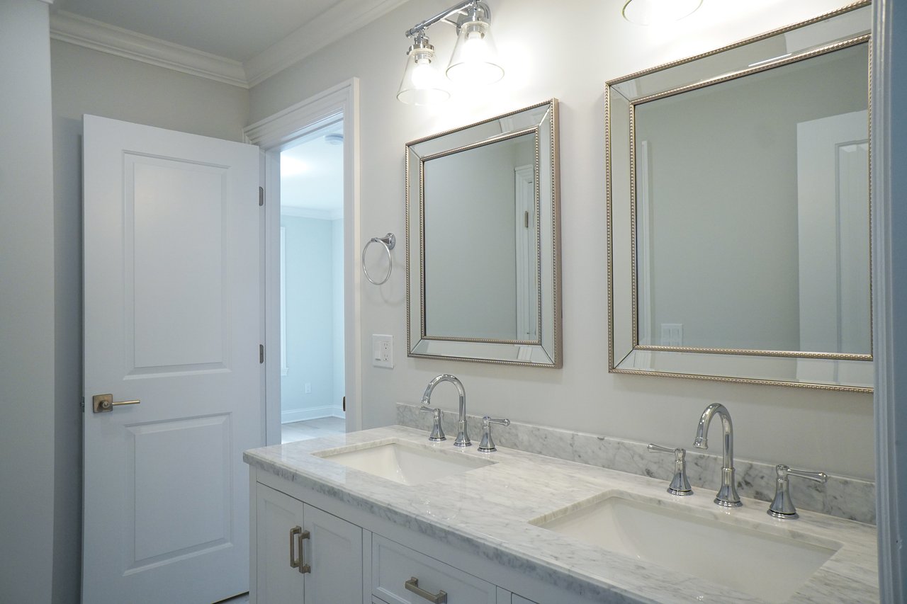 Jack and Jill Bath with marble counters and floors
