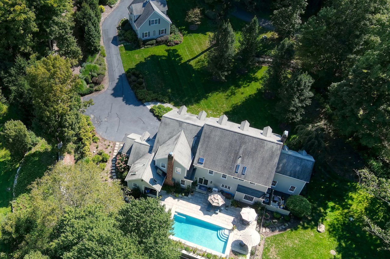 Gracious 2.41 professionally landscaped private acres to call home.