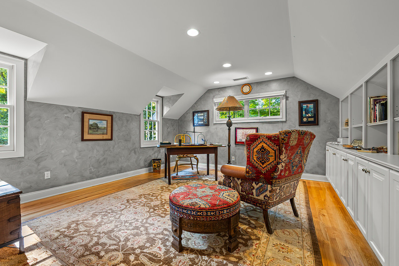 Sitting room / study with built-ins off the primary bedroom.