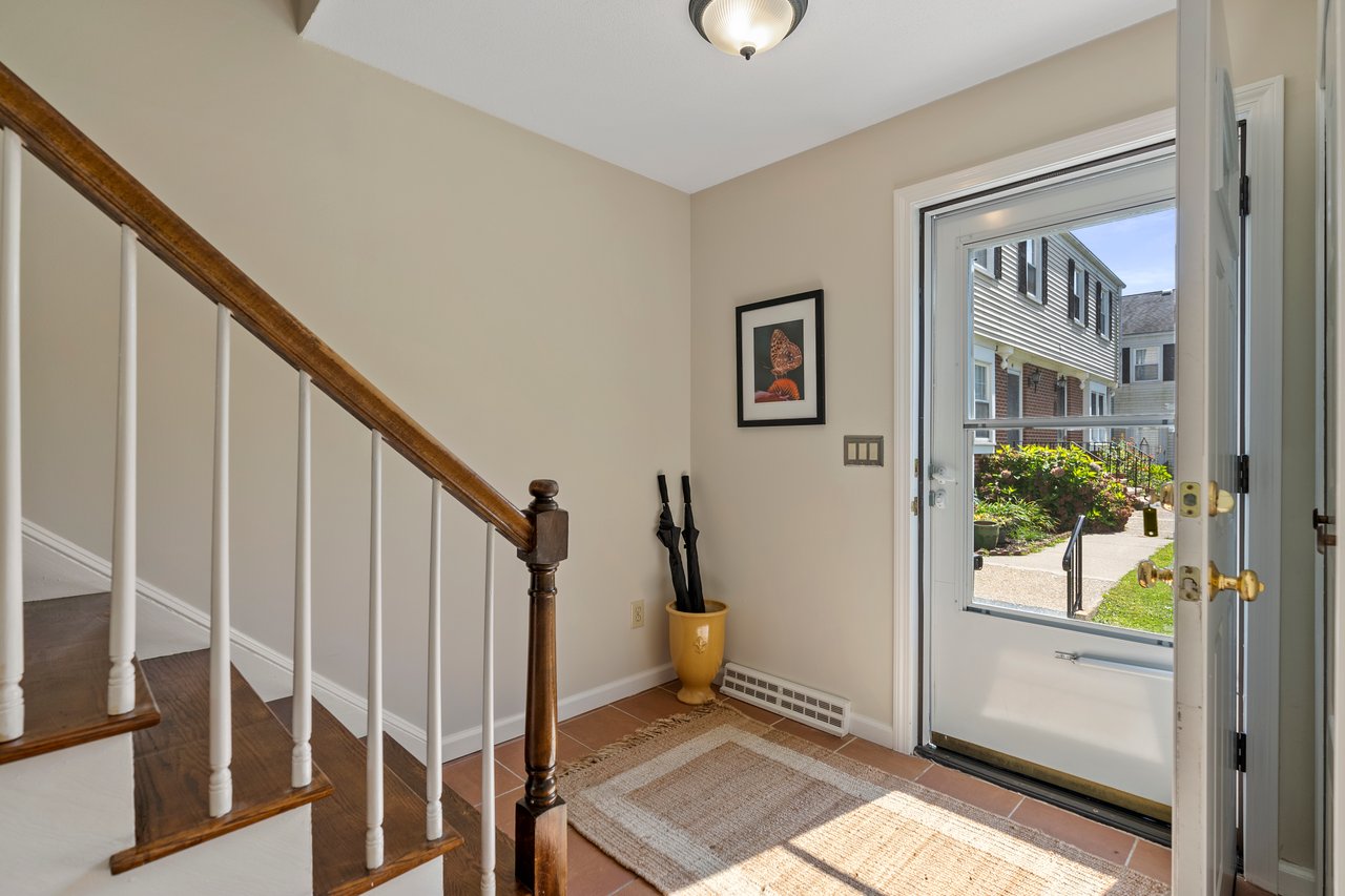 Spacious entryway and foyer with coat closet