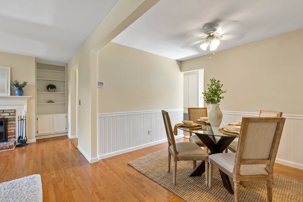 Dining area w bead board paneling and paddle fan/light