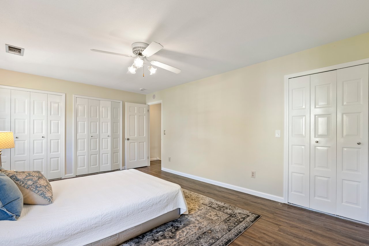 Clean as a whistle!! Spacious bedroom with brand new vinyl floor.