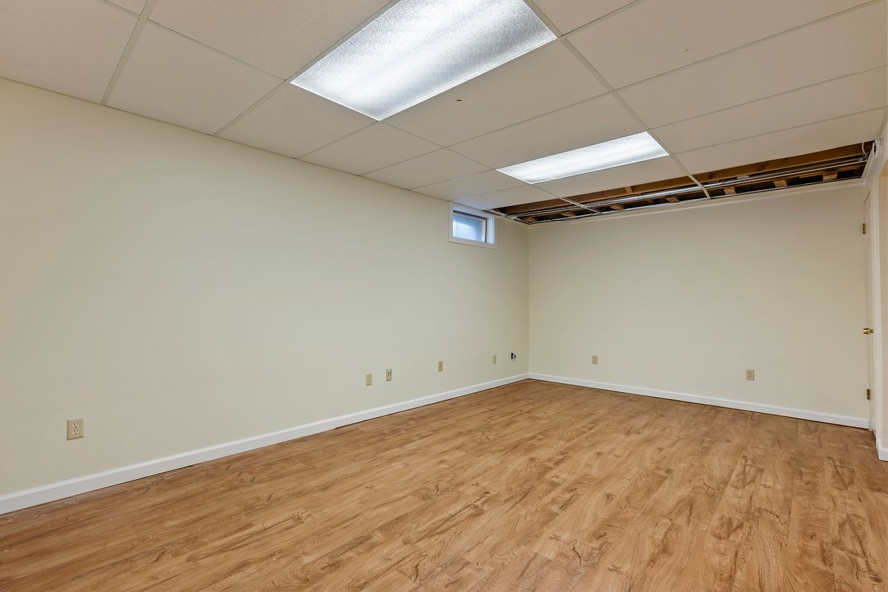 Finished lower level room can be used as an exercise space, hobby room, media, let your imagination soar!