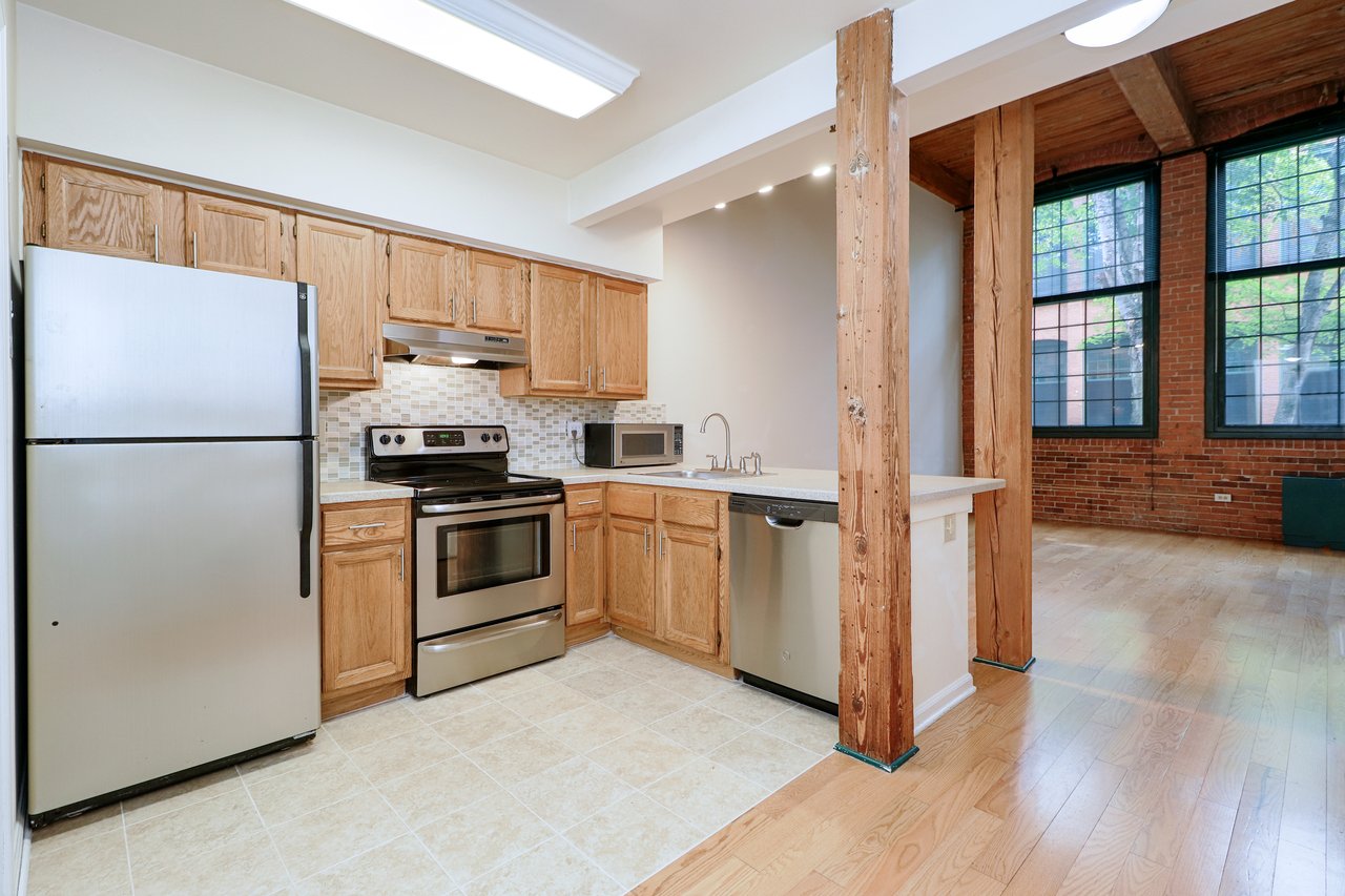 Come inside #131! The well appointed kitchen is open to the great room!