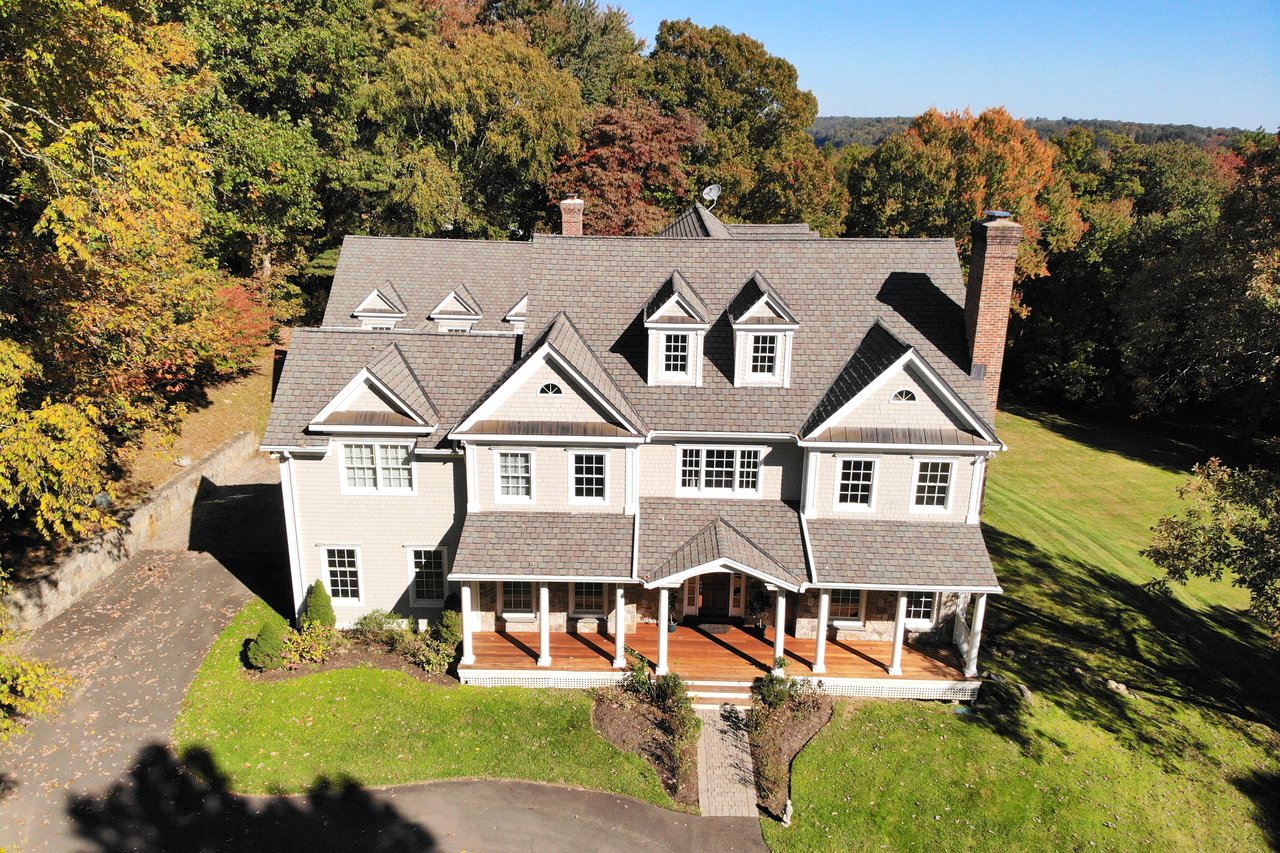 This majestic home commands the cul-de-sac.