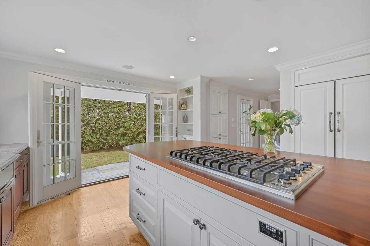 Just open the French Doors to beautiful bluestone terrace.