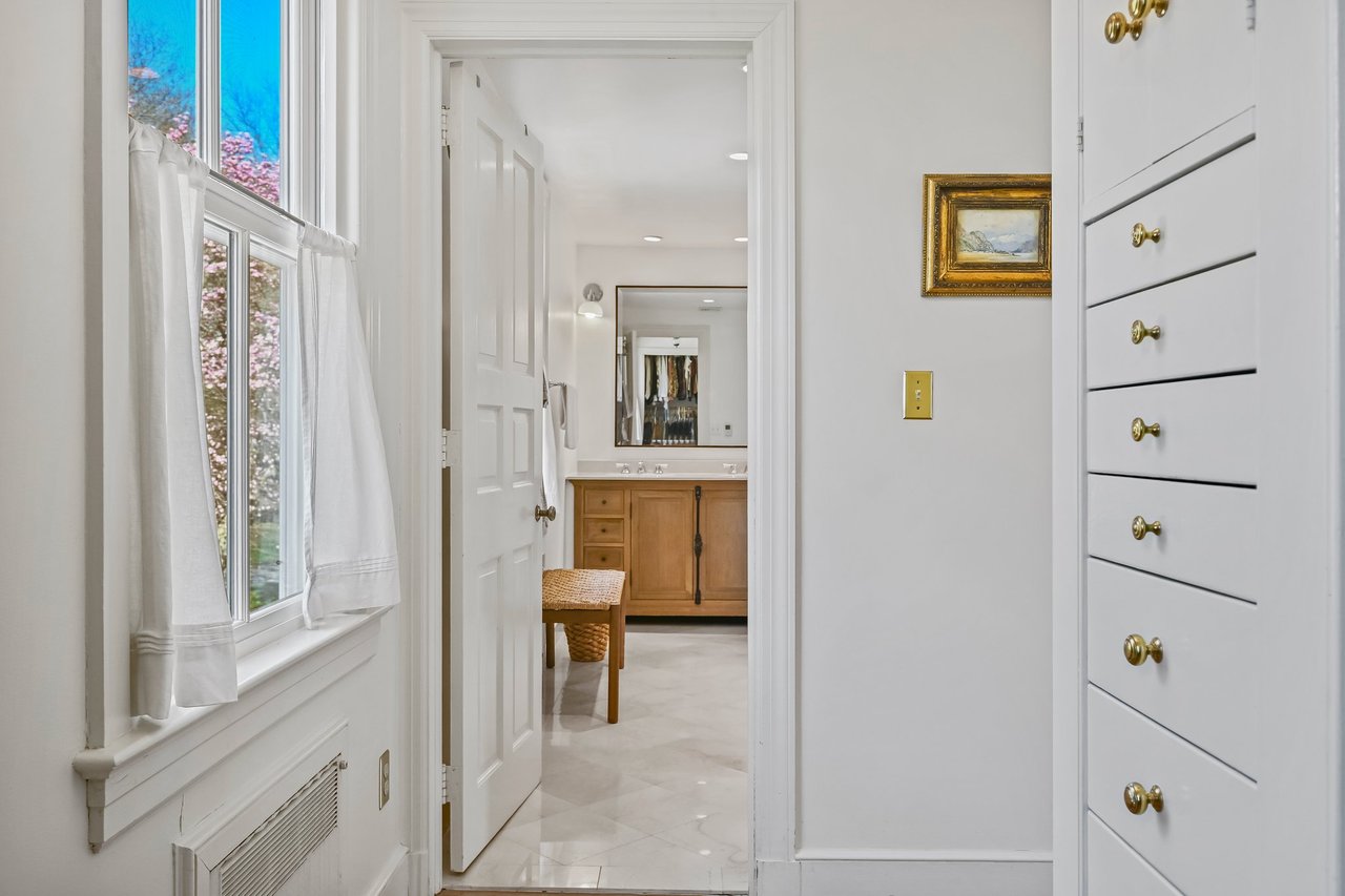 Primary walk-in-closet and dressing area