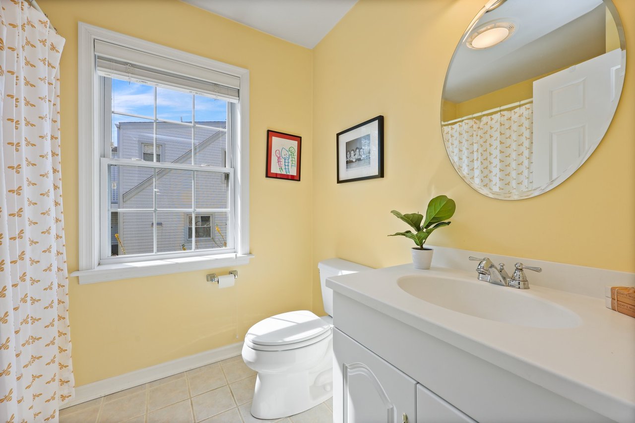 Hall bath with shower/tub services the other two BRs