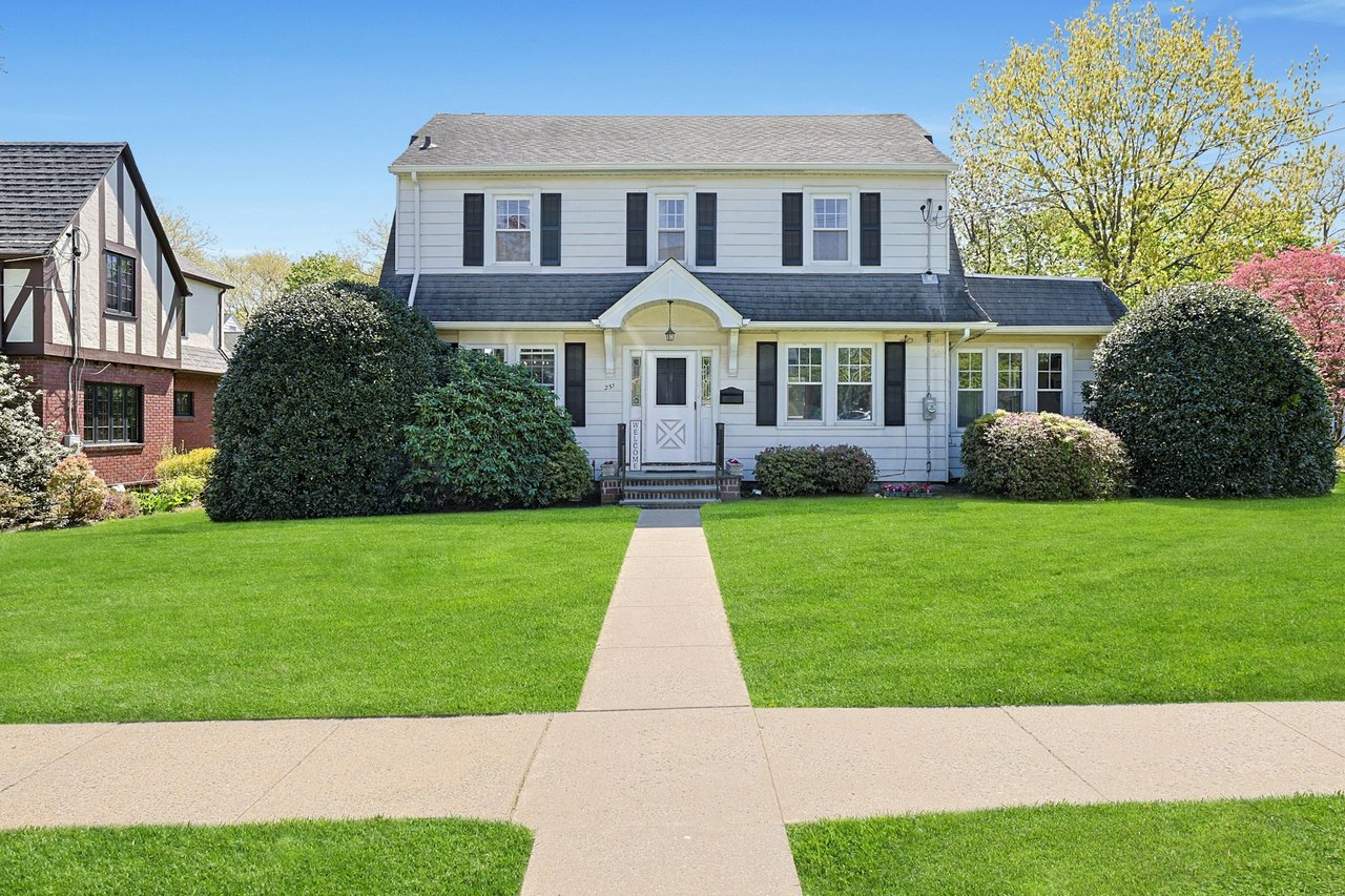 SWEET! Colonial with curb appeal for days.