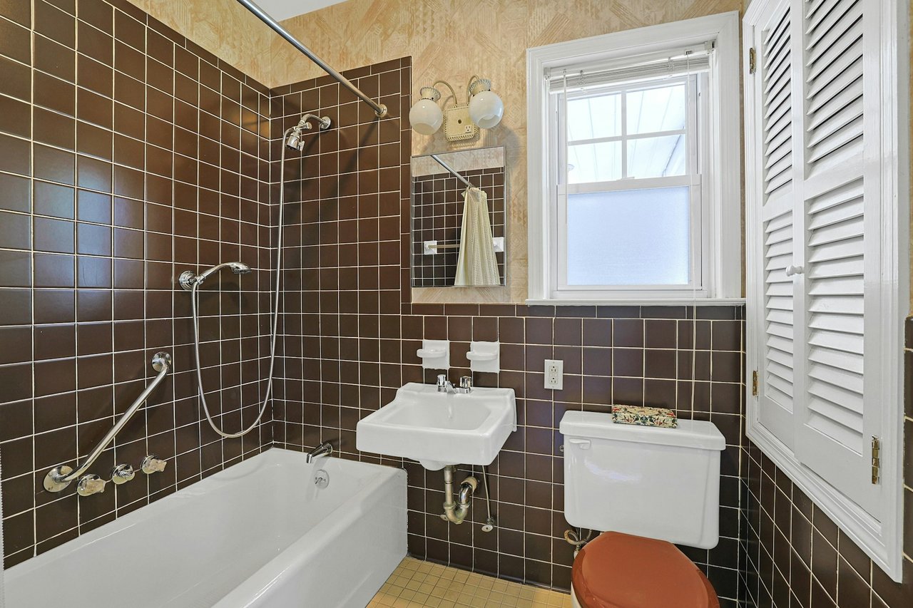 First floor Bathroom with shower / tub combo
