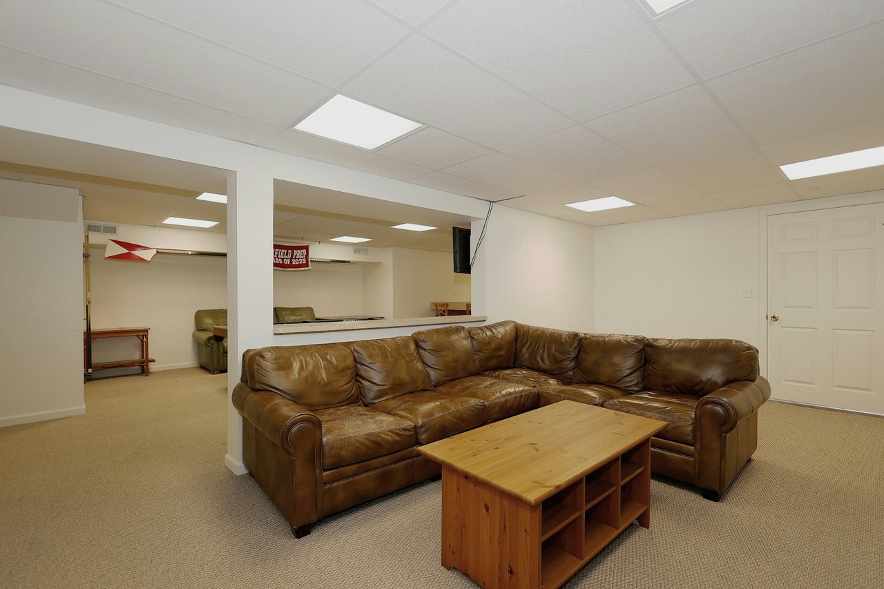 Finished Lower Level - offering ample storage.