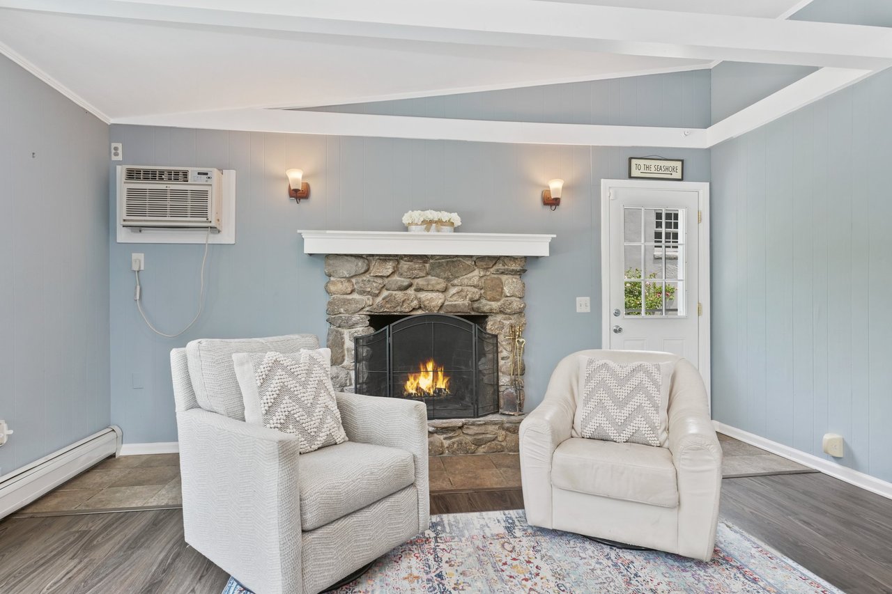 Beautiful stone fireplace and access to wrap around deck