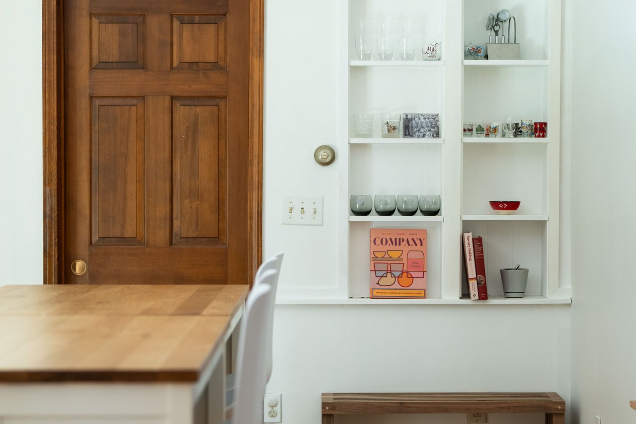 Office with wood finished floors and baseboards