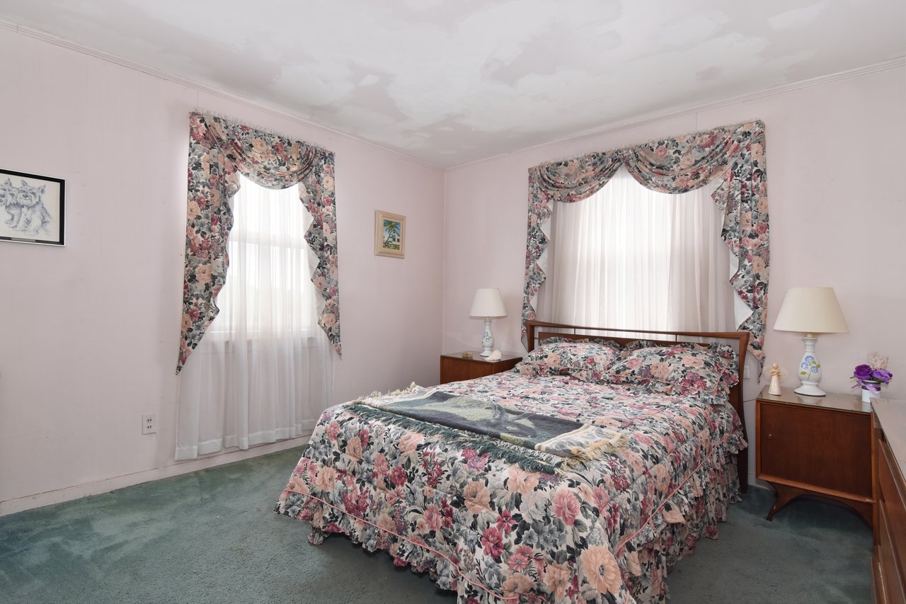 The master bedroom is spacious and conveniently located on the first floor.