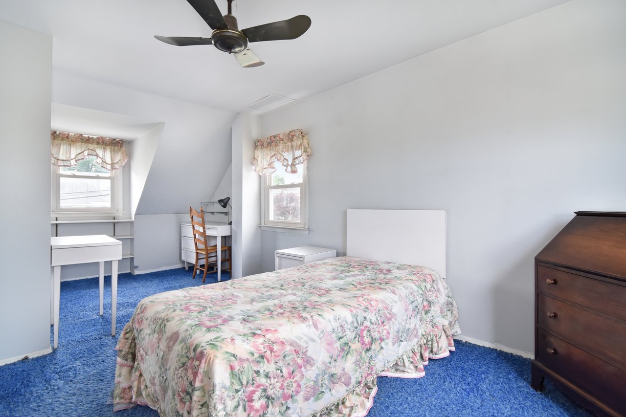 On the second floor you will find a third sizable bedroom, along with two other rooms that can be used in a myriad of ways.