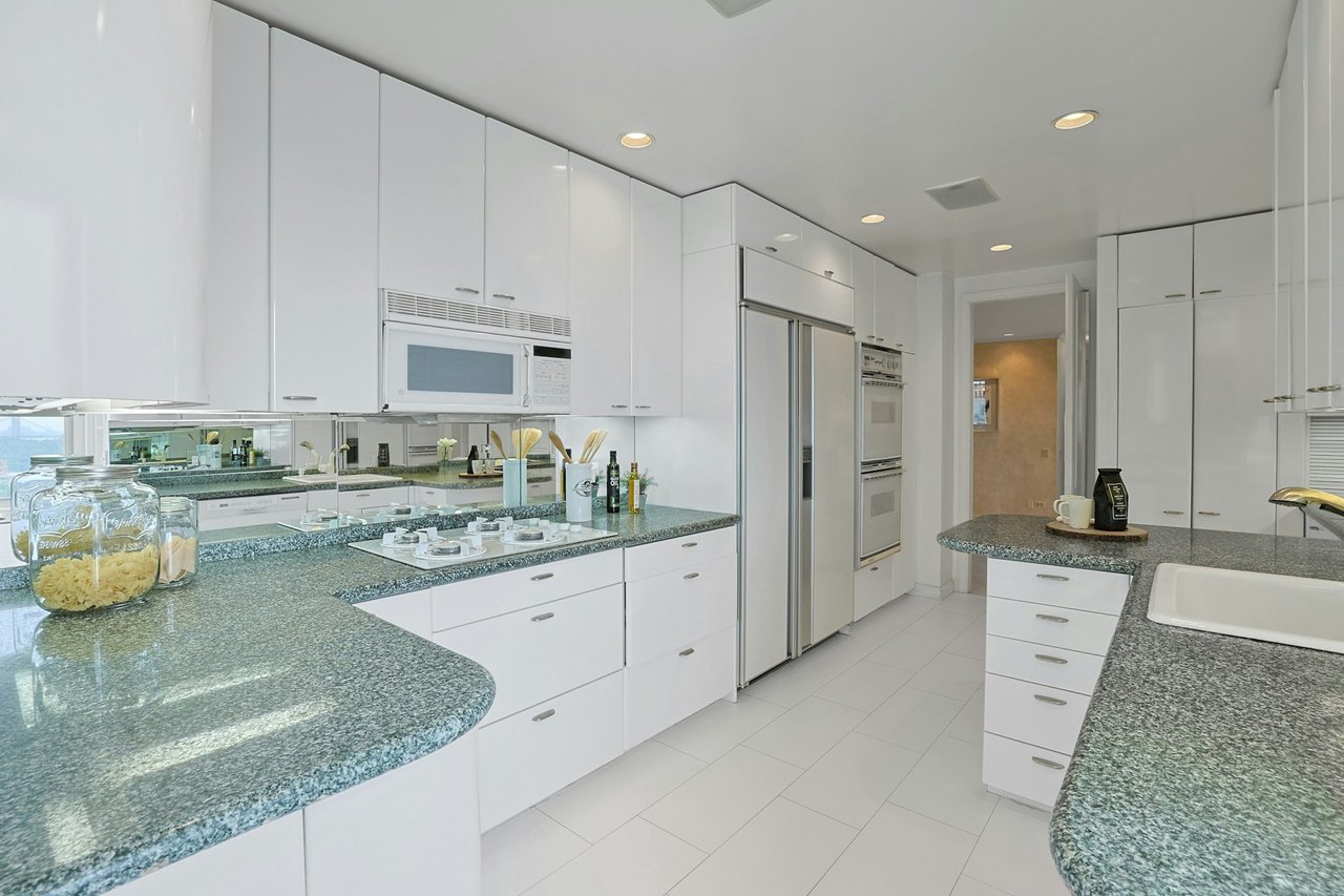 Kitchen facing foyer.