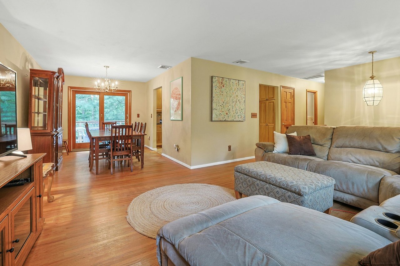 Open to Dining Area and glass door to deck.