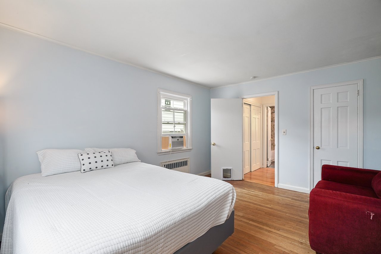 First floor bedroom with hardwood floors