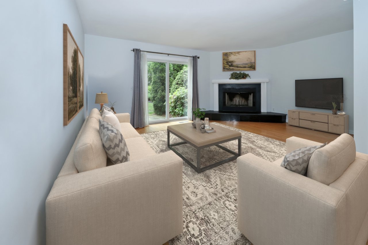 Virtually staged photo of living room.