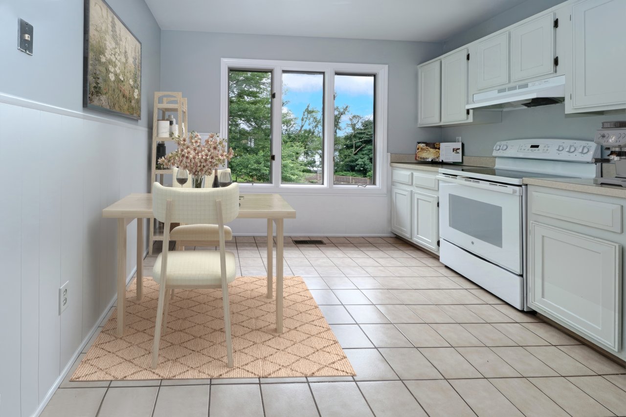 Virtually staged kitchen with woodland views.