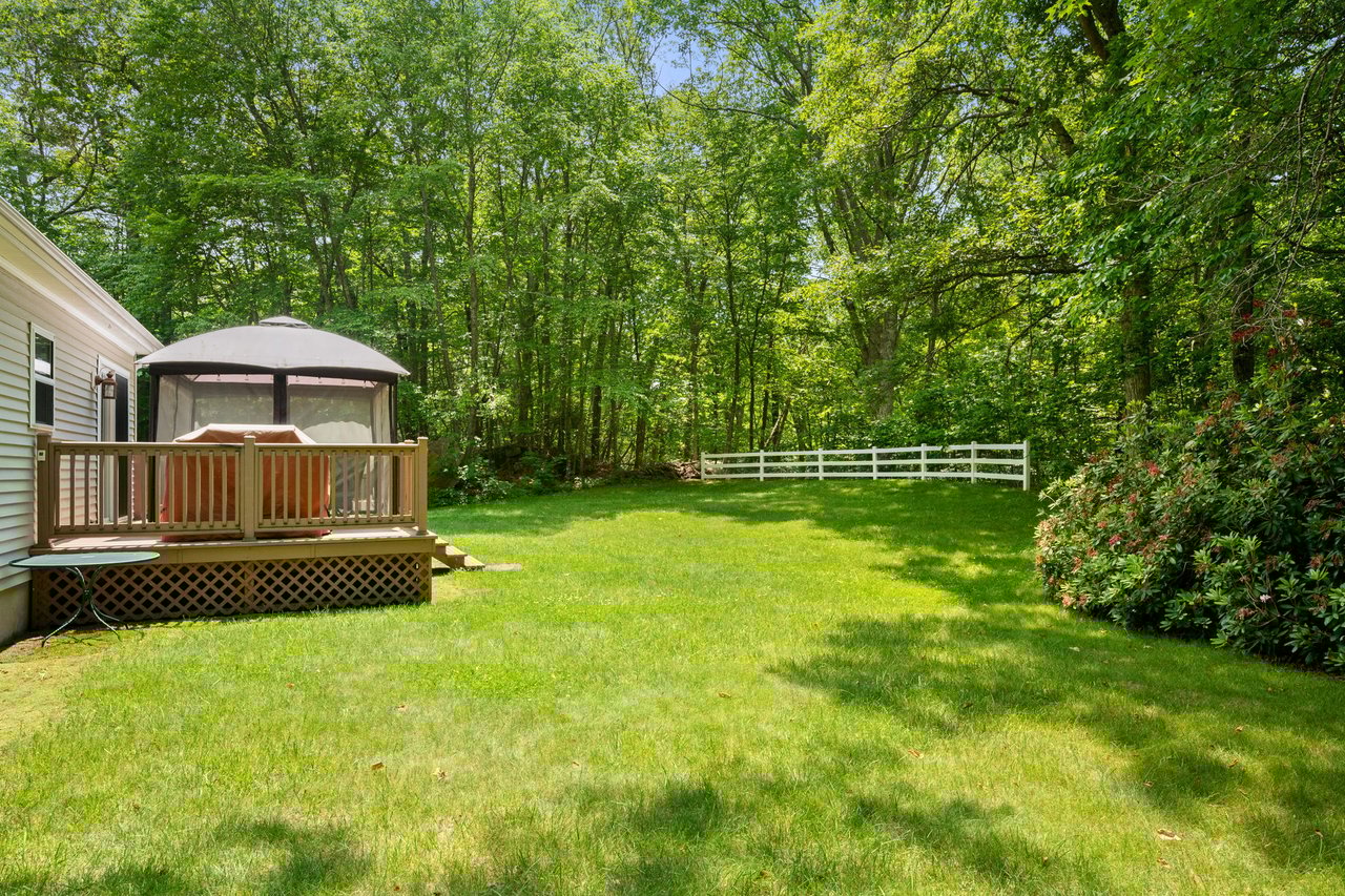 Back yard with deck and decorative fencing