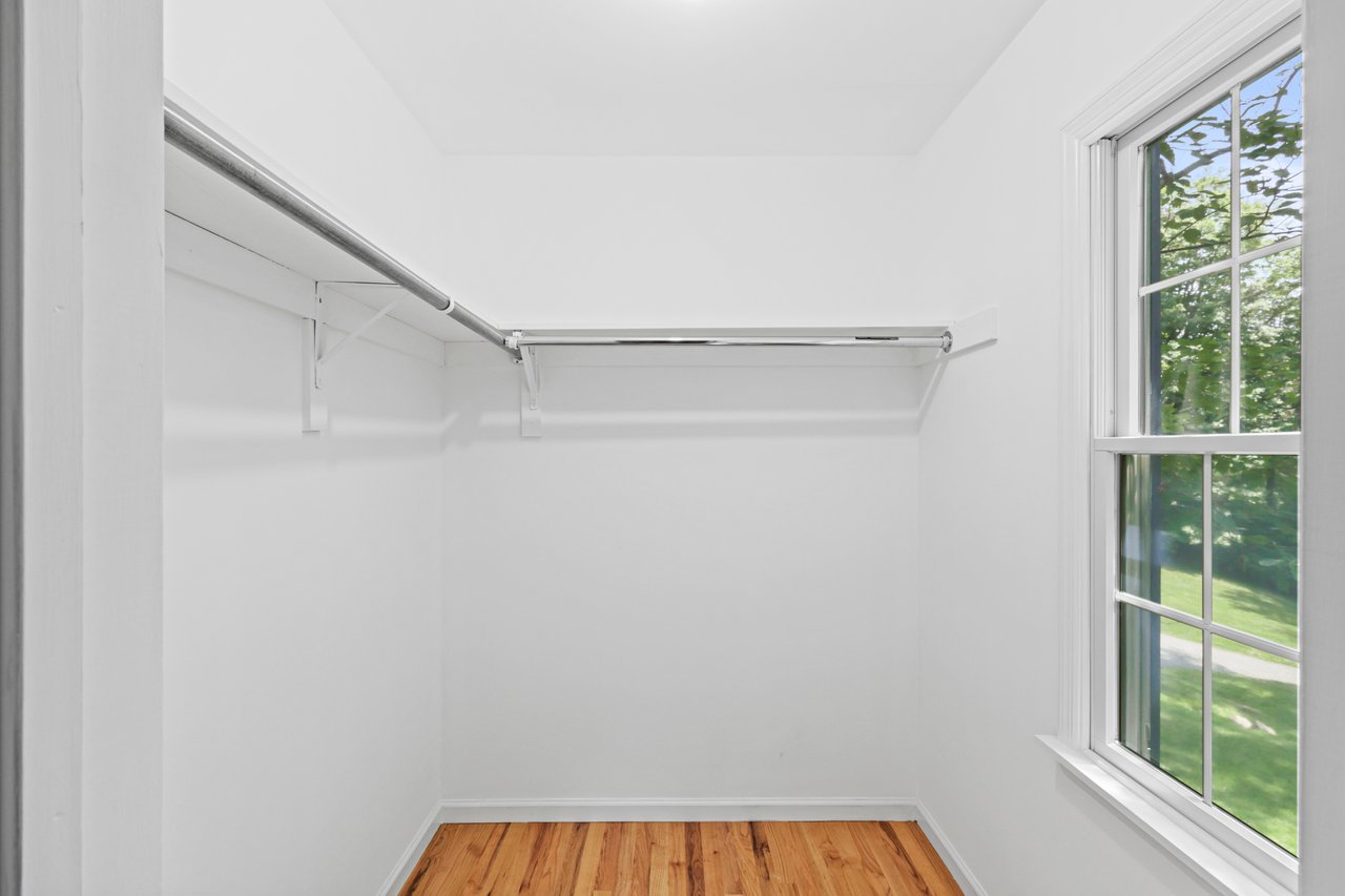 Walk-in closet in the Primary Bedroom