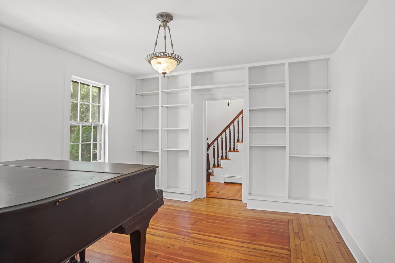 Living Room with built-ins - could also be used as a formal dining room.