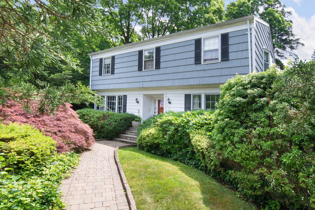 Welcome to this charming Colonial nestled in the highly sought-after "Little Farms" neighborhood of White Plains!