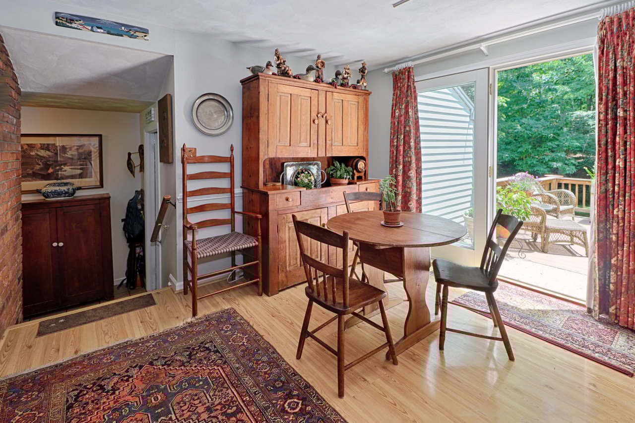 Breakfast Area With Slider To Deck & Access To Mudroom & Laundry Room