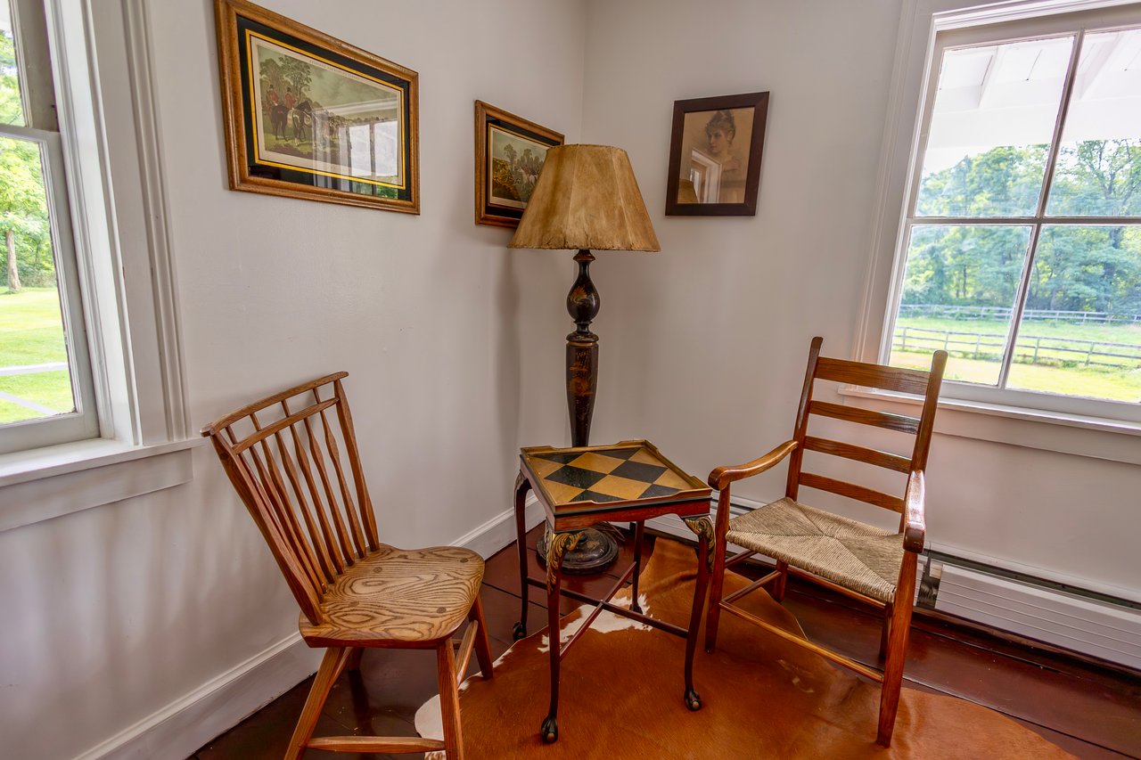 Living area featuring baseboards