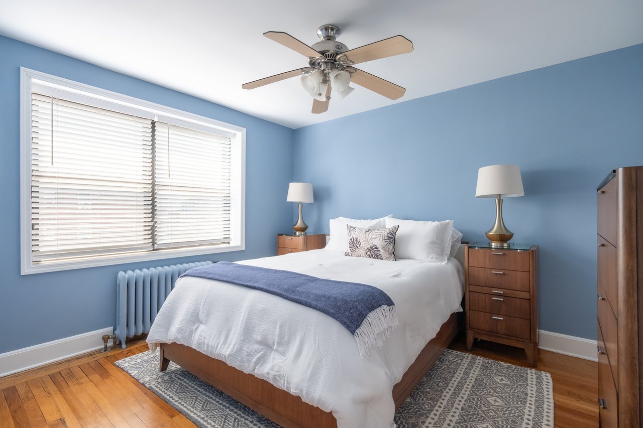 2nd Bedroom featuring radiator, wood-type flooring, and a ceiling fan
