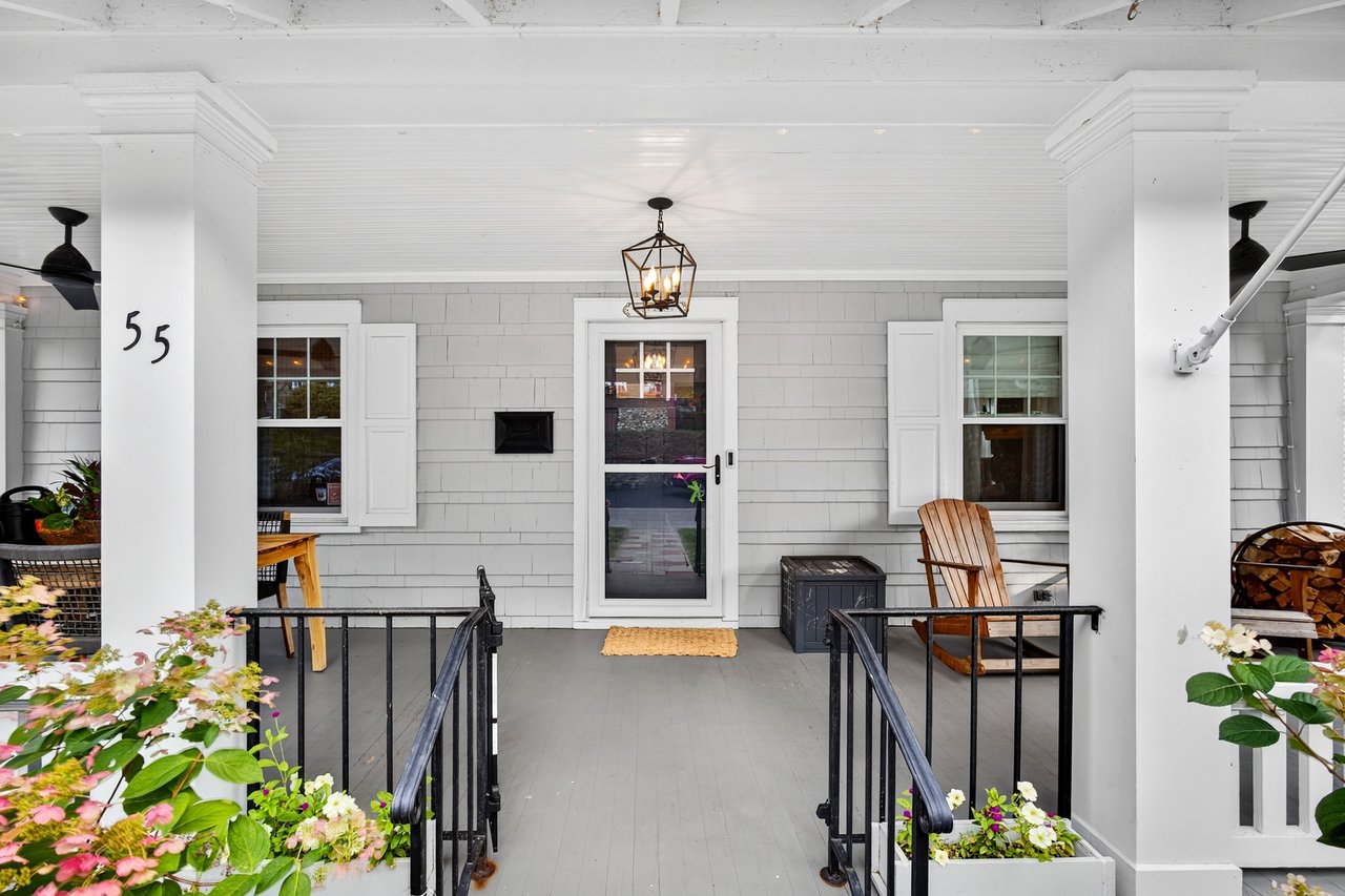 Property entrance with covered front porch to enjoy in Summer, Fall, and Spring.