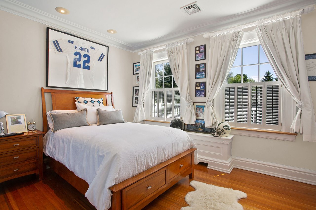 Second floor bedroom with custom built-ins.