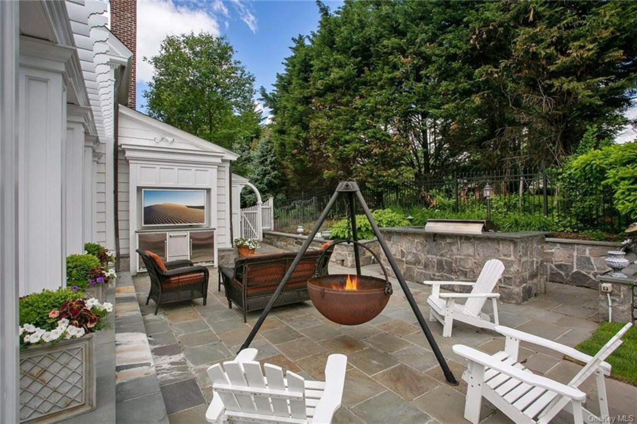 Cauldron fire-pit or kick back and watch TV while grilling on your Wolf BBQ grill.