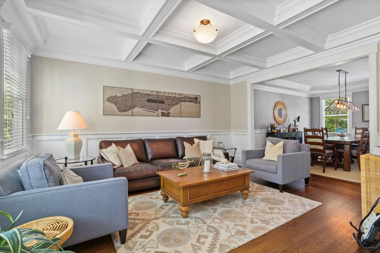 Living room with view into dining room