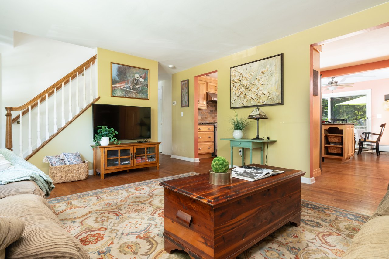Living area showing entrance to kitchen and dining.