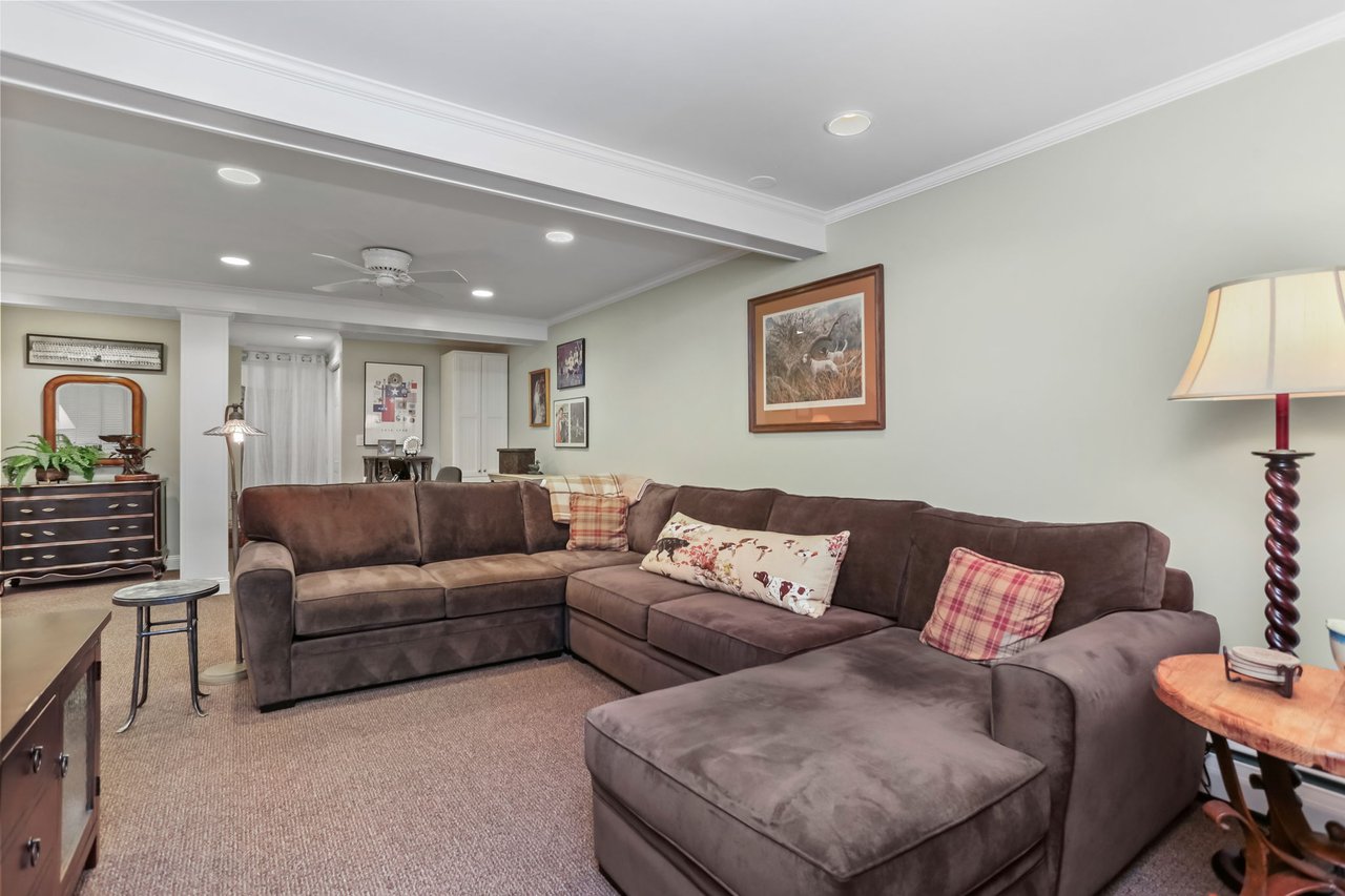 Lower Level with high ceilings and undermount lighting.