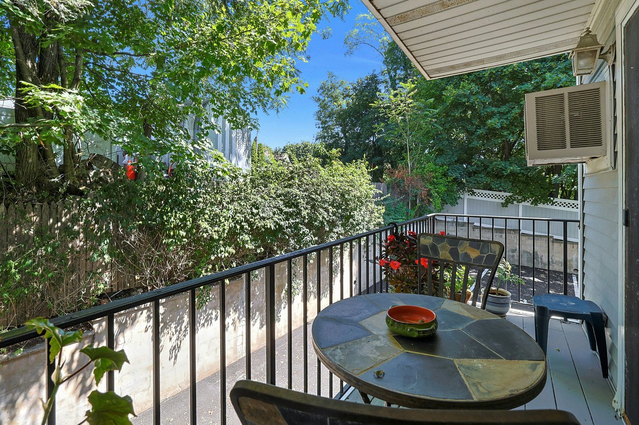 The living room opens to Balcony #1