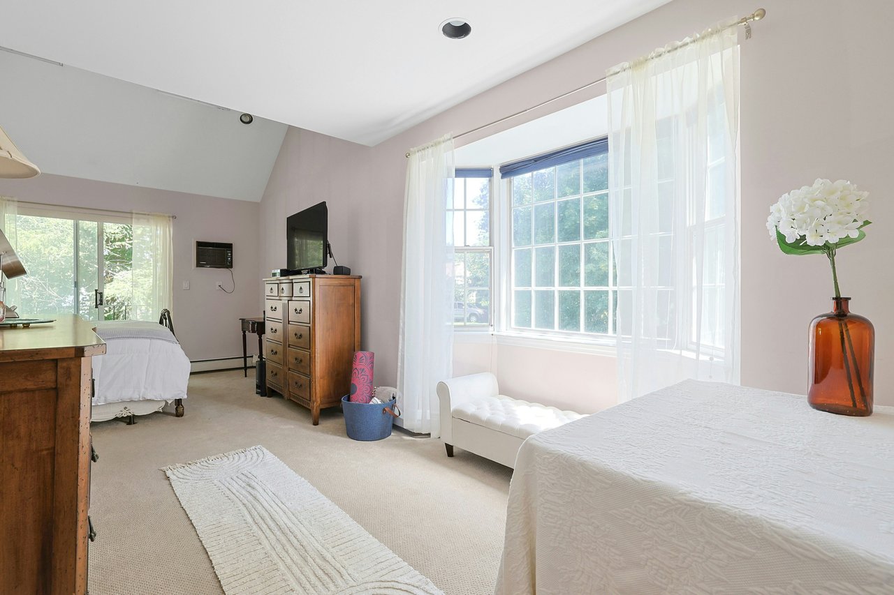 Large bedroom mirrors space below
