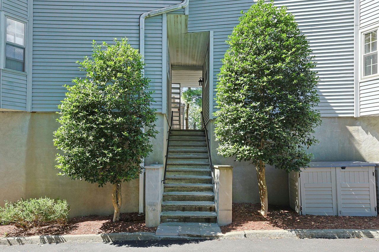 Around the corner from #16 garage is the shortcut back stairs to Unit.