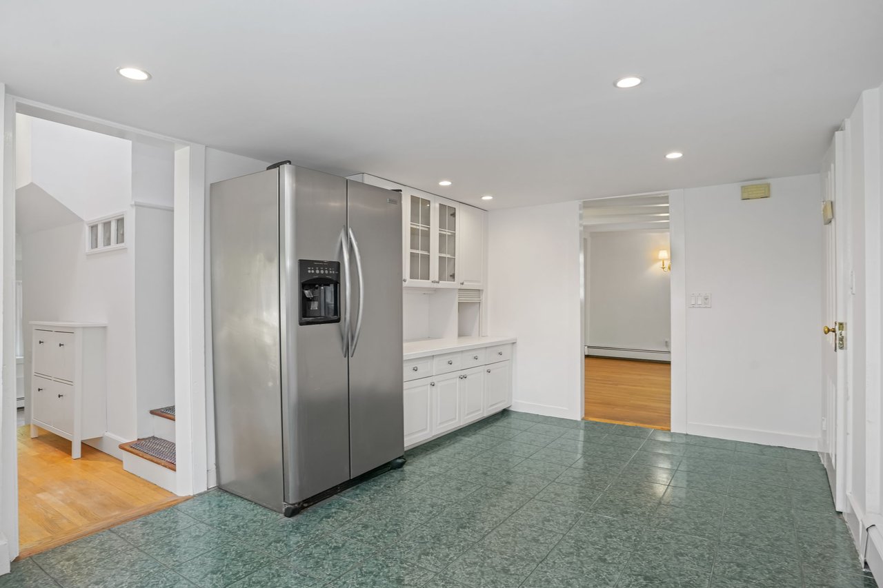 A few steps to the lower playroom (above ground)