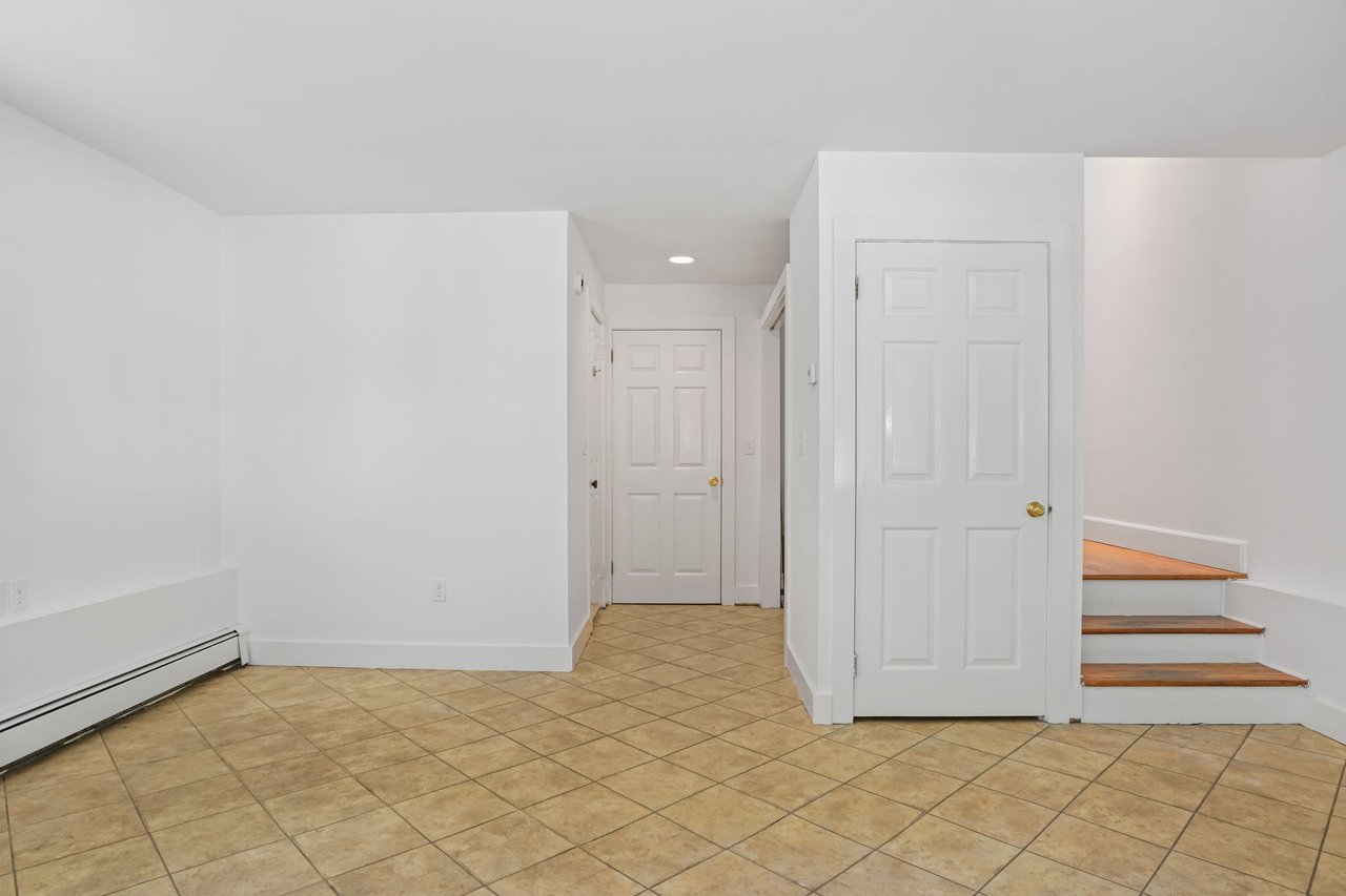 Laundry and full bath in center hall area