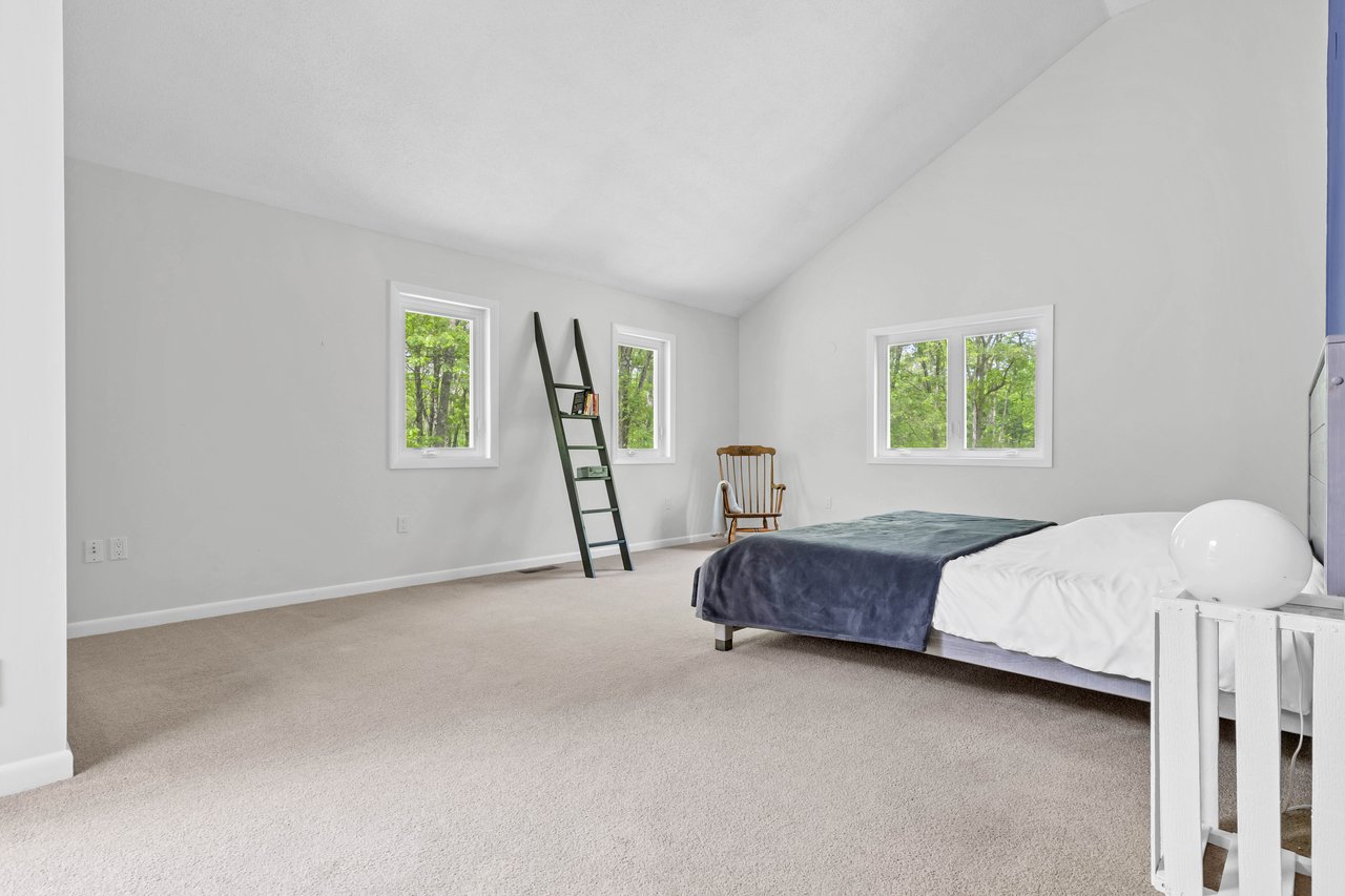 The primary bedroom suite conveniently located on the main floor