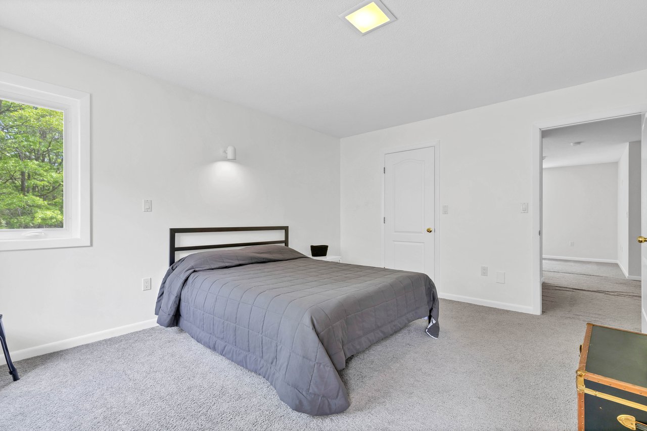 2nd primary bedroom with walk in closet & full bathroom