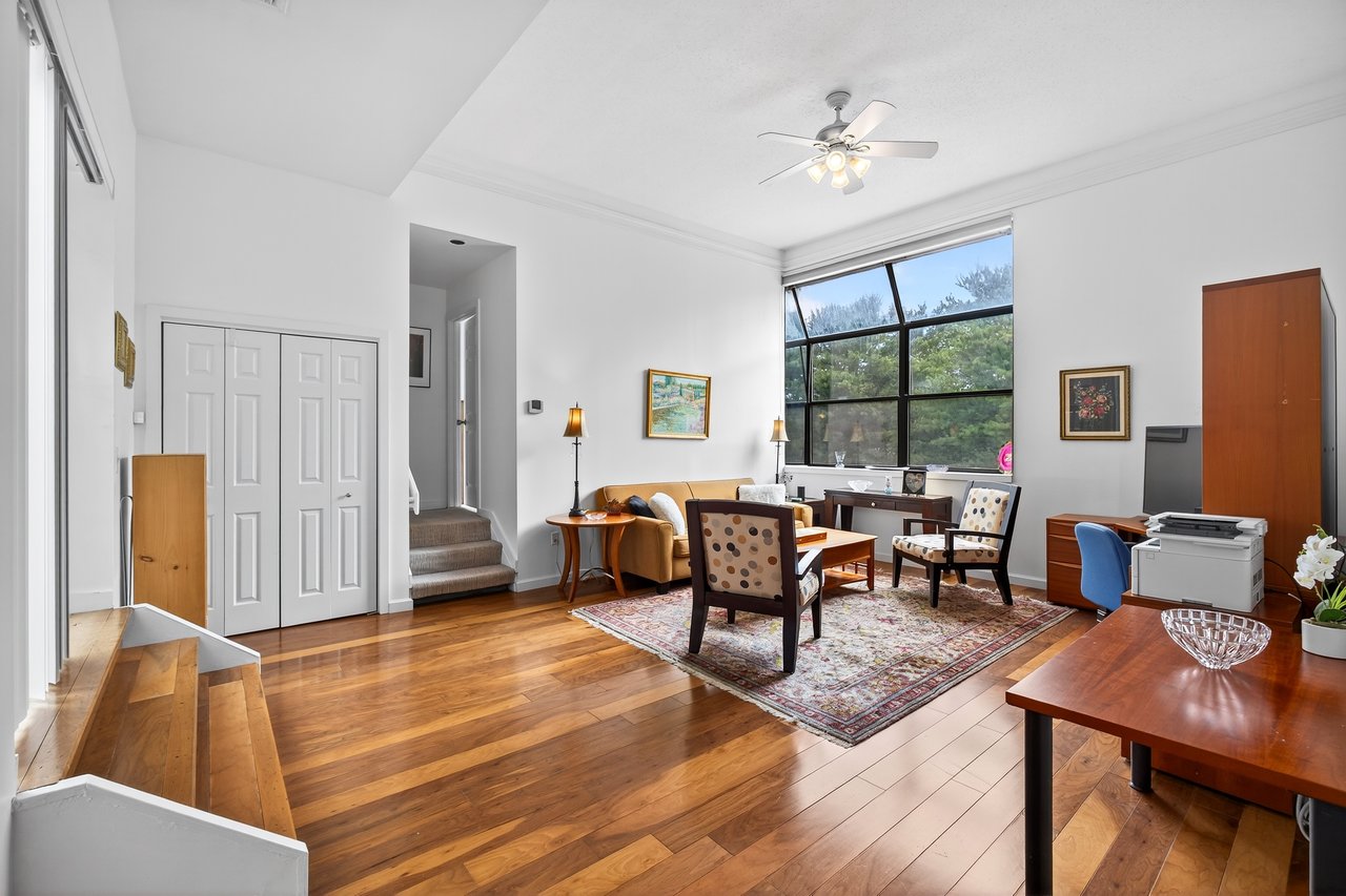 Welcome Home!! Living room with hardwood / wood-style floors, a ceiling fan, crown molding, and stairs...