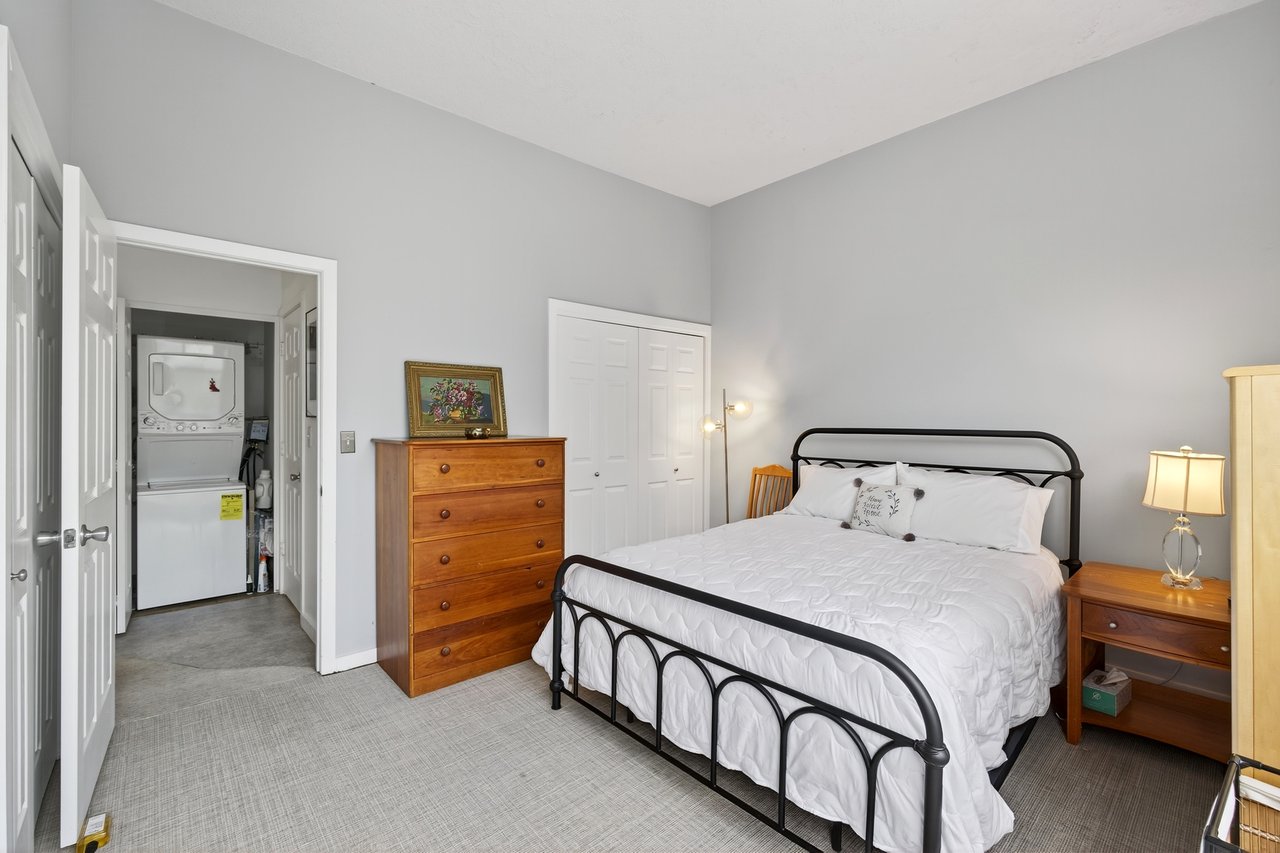 Bedroom featuring carpet flooring, featuring 2 large closets...