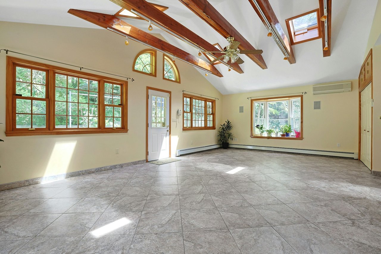 High ceilings, tiled floor, exits to back yard and to patio