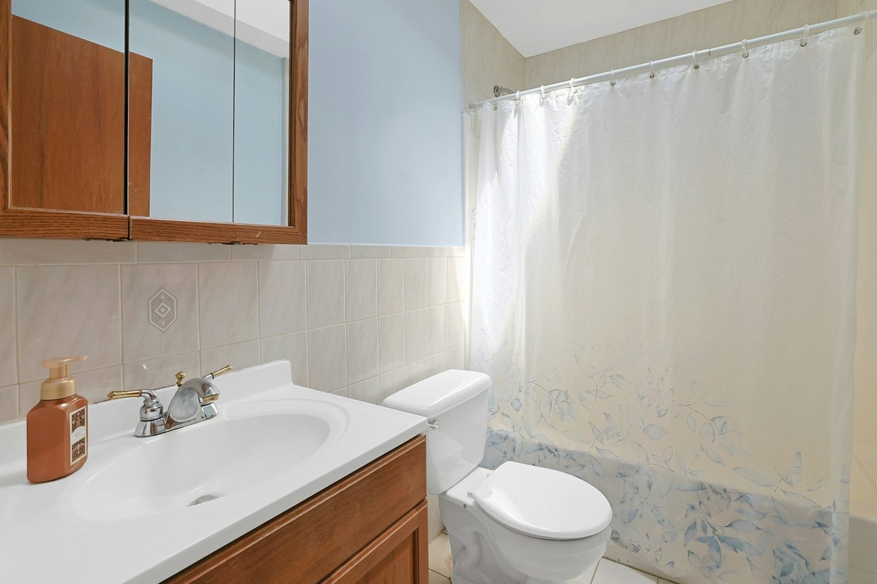 Second Floor Hall bathroom with tub and shower.